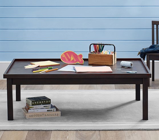 kids activity table with bookshelves
