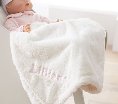 baby doll with blanket